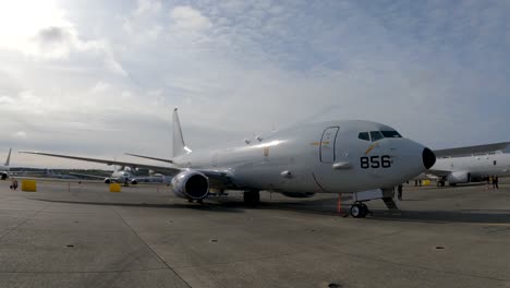 medium orbiting shot of a us navy cargo jet