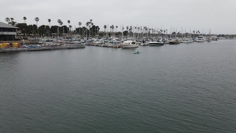 Kayaking-through-a-scenic-harbor-aerial