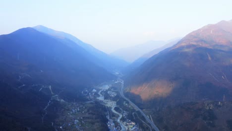china`s rapid infrastructure development. buidling highways across mountains and valleys