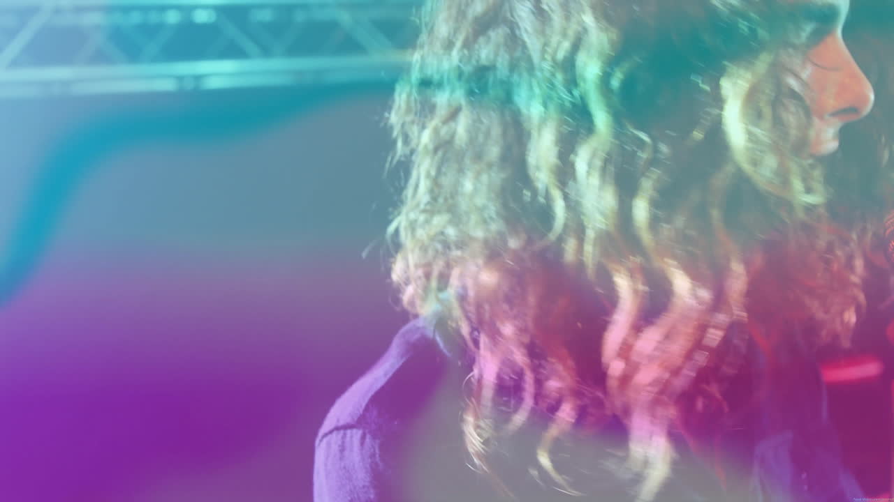 Female performer showcasing lighting tech, with animated teal magenta overlays highlighting truss