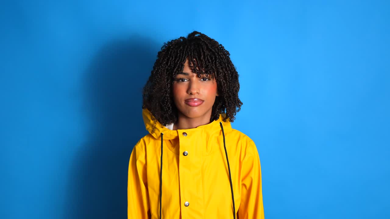 Woman in Yellow Raincoat