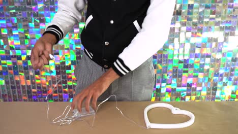 setting up new heart shaped led light with batteries, portable lamp