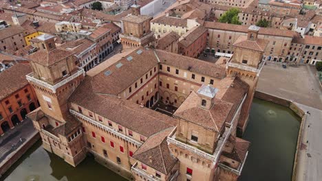 drone lowers altitude near castello estense - smooth turn and tower approach