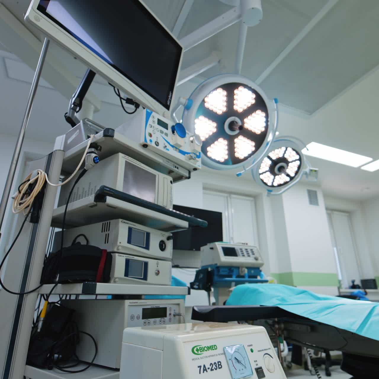 Modern surgery room for neurosurgical procedures. Low angle view on the varied equipment filling the operational theatre