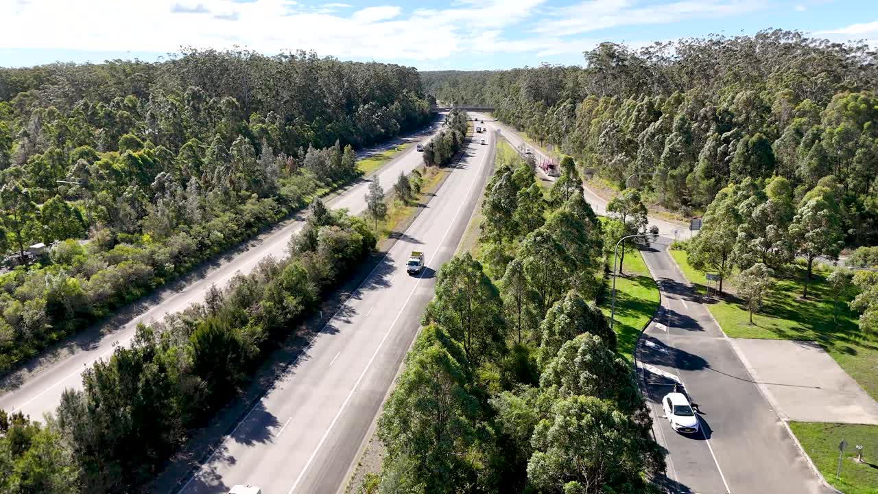 Drone footage looking over traffic over the Pacific Highway in northern New South Wales