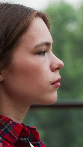 woman struggles with thoughts by windows. sad woman determination to seek help shines through signalling hopeful step towards managing problems