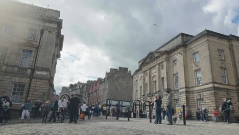 tourists, visitors and locals on the royal mile, edinburgh