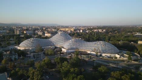 Aerial-Boom-Shot-Reveals-Budapest-Zoo-in-City-Park-at-Sunset