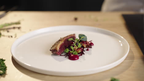 seared duck breast with beetroot and microgreens