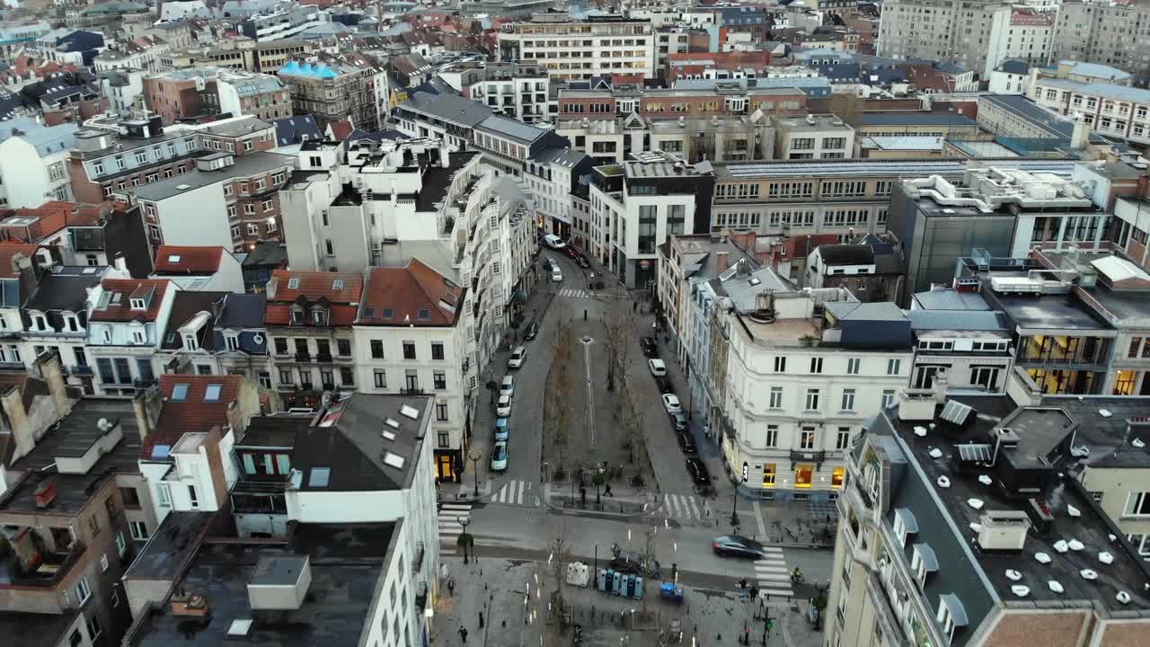 Aerial close flight over Brussels' streets on cloudy day,Belgium