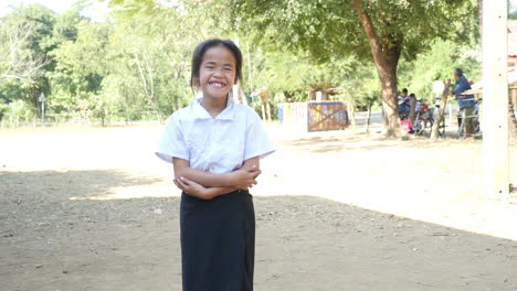 smiling schoolgirl in rural setting