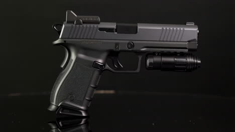 tactical handgun with underbarrel light