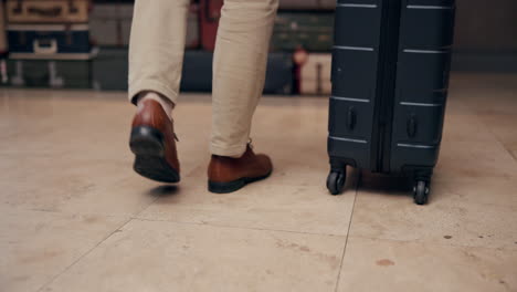a person walking with a suitcase