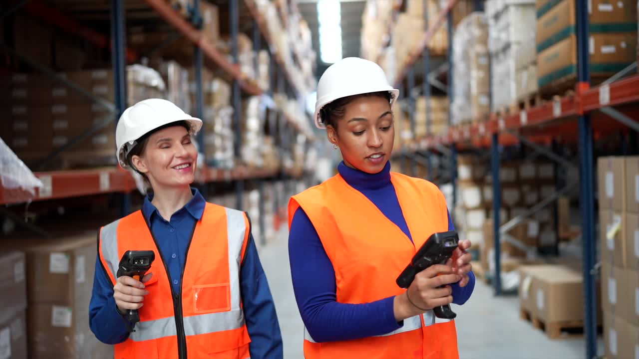 Warehouse Workers Using Barcode Scanners