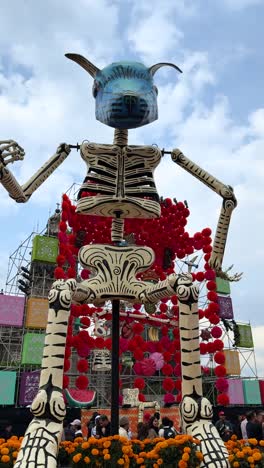 giant alebrije skeleton at day of the dead celebration