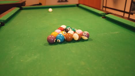 snooker billiard table ready to play orbital shot warm light