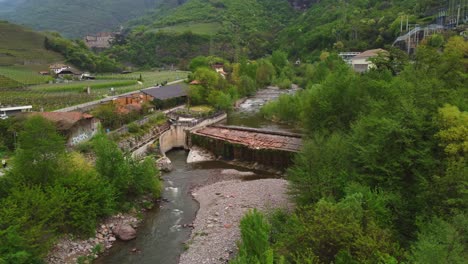 blue hour aerial: river near via santa maddalena di sotto, bolzano, italy