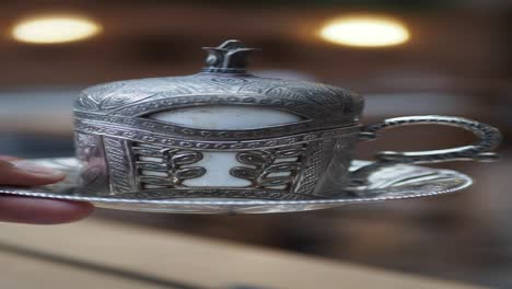 close-up of a turkish coffee cup and saucer