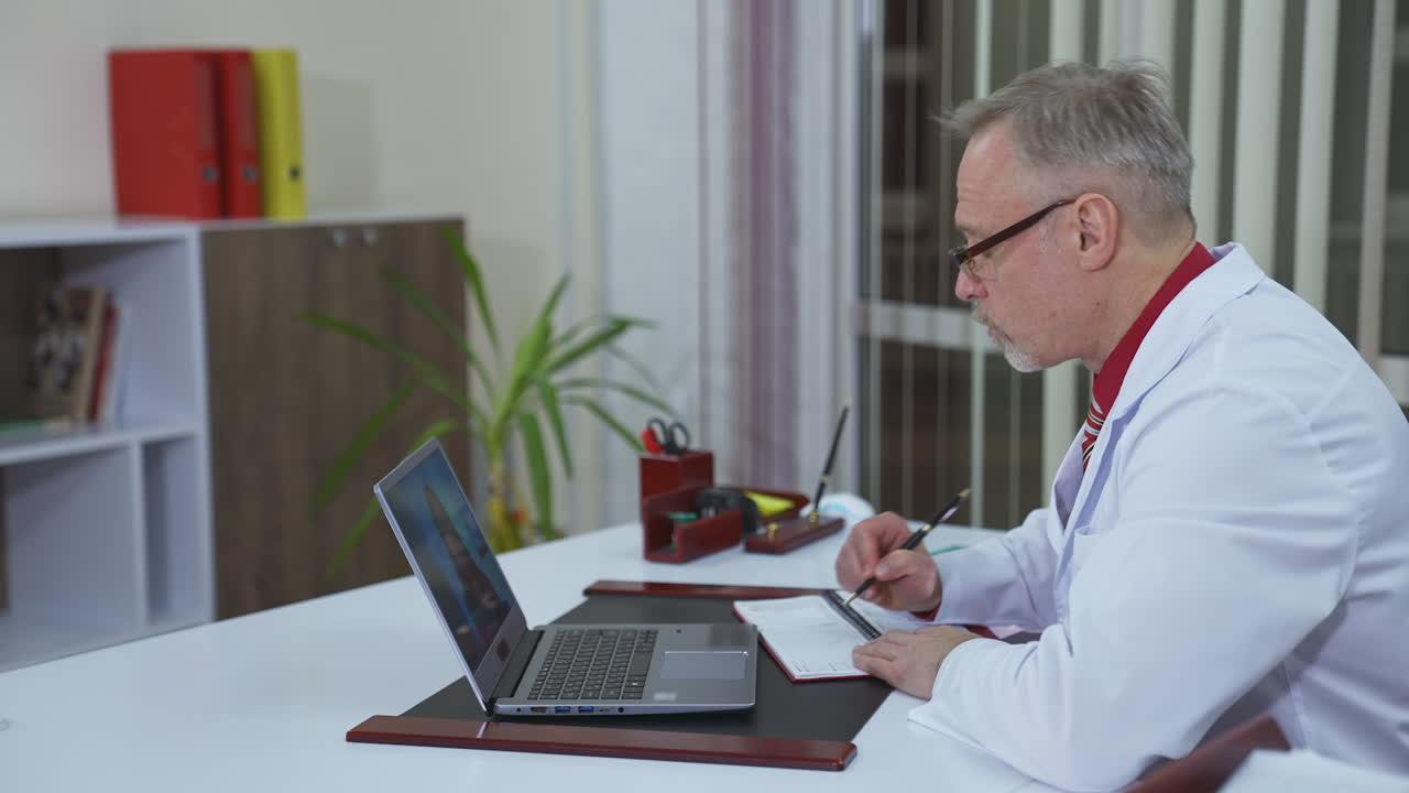 Doctor consulting giving advices. Doctor looking at camera and giving positive encouragement