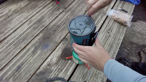 cooking on a mountain on a tent pad