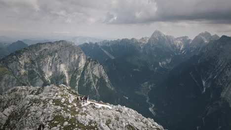 drone shot of mountain rombon and surrounding mountains and valley, cloudy sky