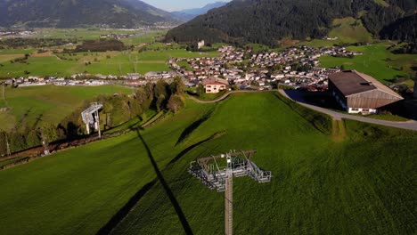 ski lift tower of maiskogelbahn at the rural town of kaprun in austria