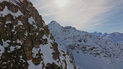 aerial views of high alpine peaks in verbier, switzerland, with the iconic bec des rosses towering in the background.