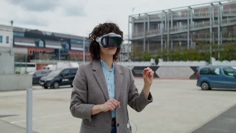 woman wearing vr headset in city parking lot