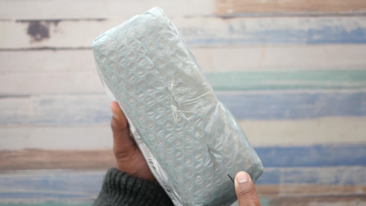 Unboxing a Package with Bubble Wrap