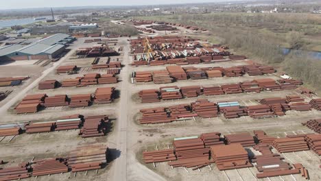 Aerial-of-old-rusty-pipes-on-metal-junk-yard