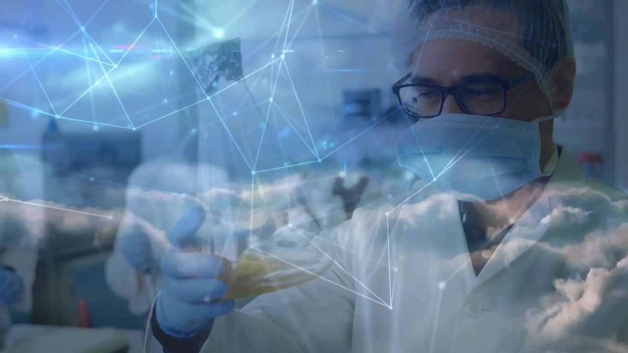 Male lab scientist raising flask examining clarity, generating digital overlay and filling vial