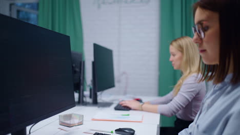 Women working on computers in an office