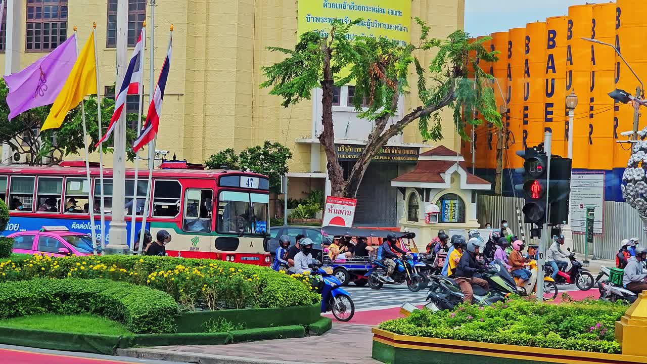 Motor Vehicles Wait at a Traffic Light in Bangkok, Thailand.