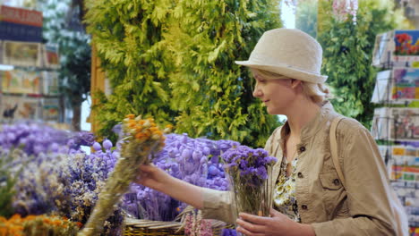 Woman-Bouquet-Of-Flowers-In-Flower-Market