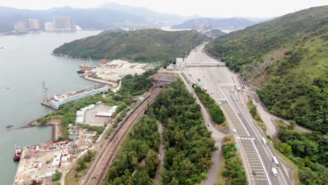 traffic on a rural highway interchange in hong kong, aerial view