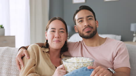 happy couple, eating popcorn