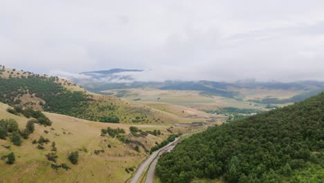 overlook of preston idaho mountains road through canyon 4k