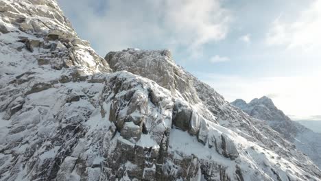 Ascending-a-steep-mountain-side-in-northern-Norway-during-a-fine-winter-day