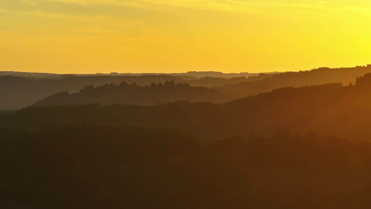 Golden Sunset Over Mountain Landscape
