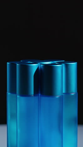 blue perfume bottles display