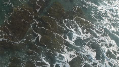 views from a drone of beaches with gentle waves on the shores of the beaches of the costa del sol in malaga spain
