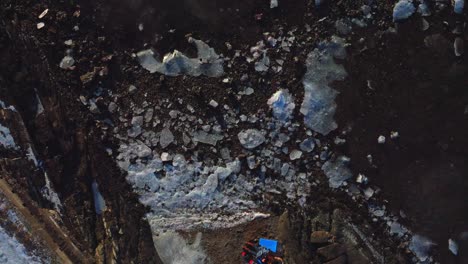 frozen icy glacier coastline hovedøya island hovedoya aker brygge lindøya oslo fjord norway norge aerial drone birds eye view norwegian sea winter daytime afternoon sunny monastery upwards
