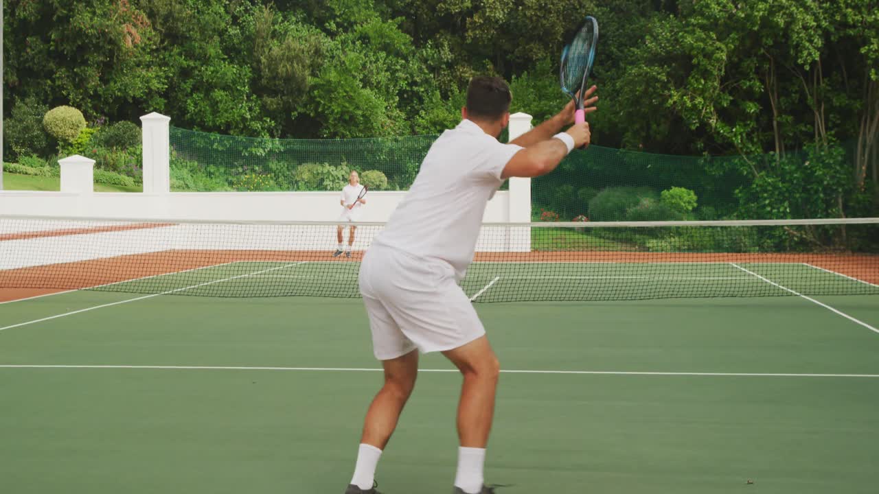 Tennis players playing a point