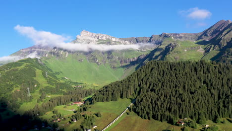 Wide-rotating-drone-shot-of-the-Swss-Alps-and-Murren,-in-the-Bernese-Highlands-of-Switzerland