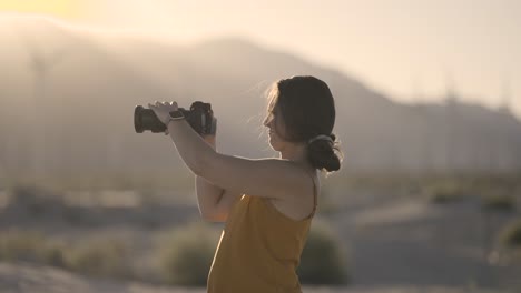 girl photographing palm springs area desert california with a sony a1 camera