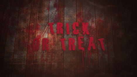 trick or treat on dark wood texture with blood