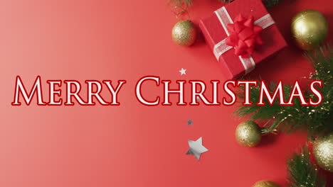animación de feliz navidad y decoraciones sobre fondo rojo con presente