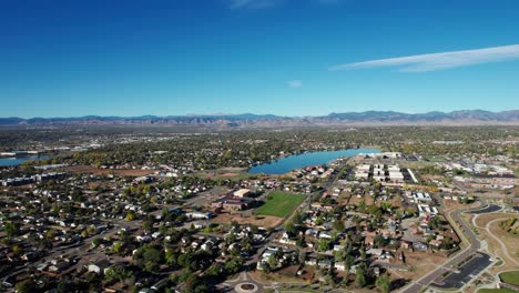 drone aerial view of a nice suburb outside of denver, co with a lake