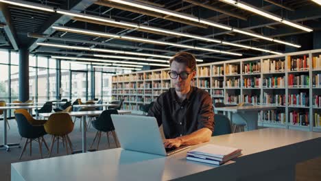 student working in a modern library