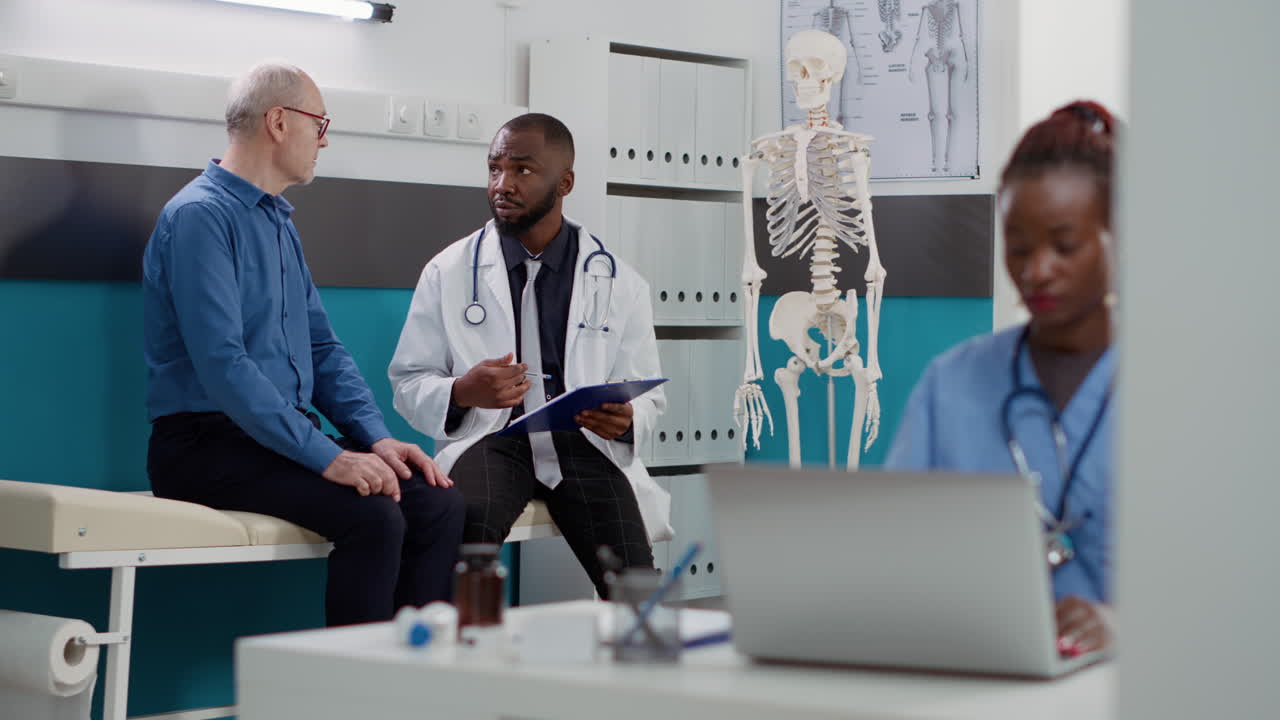 Doctor consulting with patient in clinic